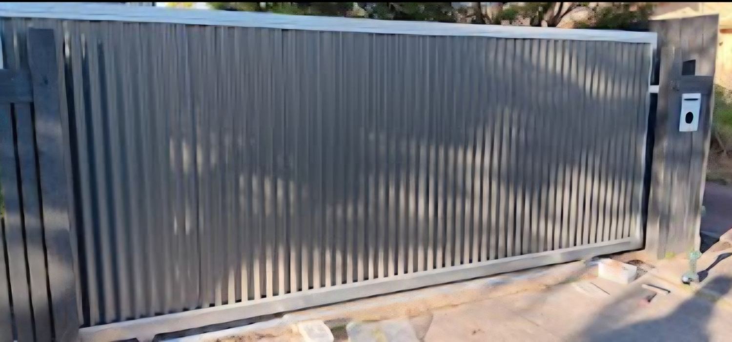 Automatic sliding driveway gate by Mordy Fencing 6