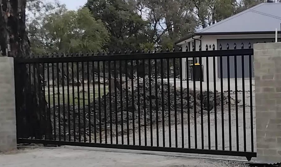 Powder coated tubular metal front fence and gate by Mordy Fencing